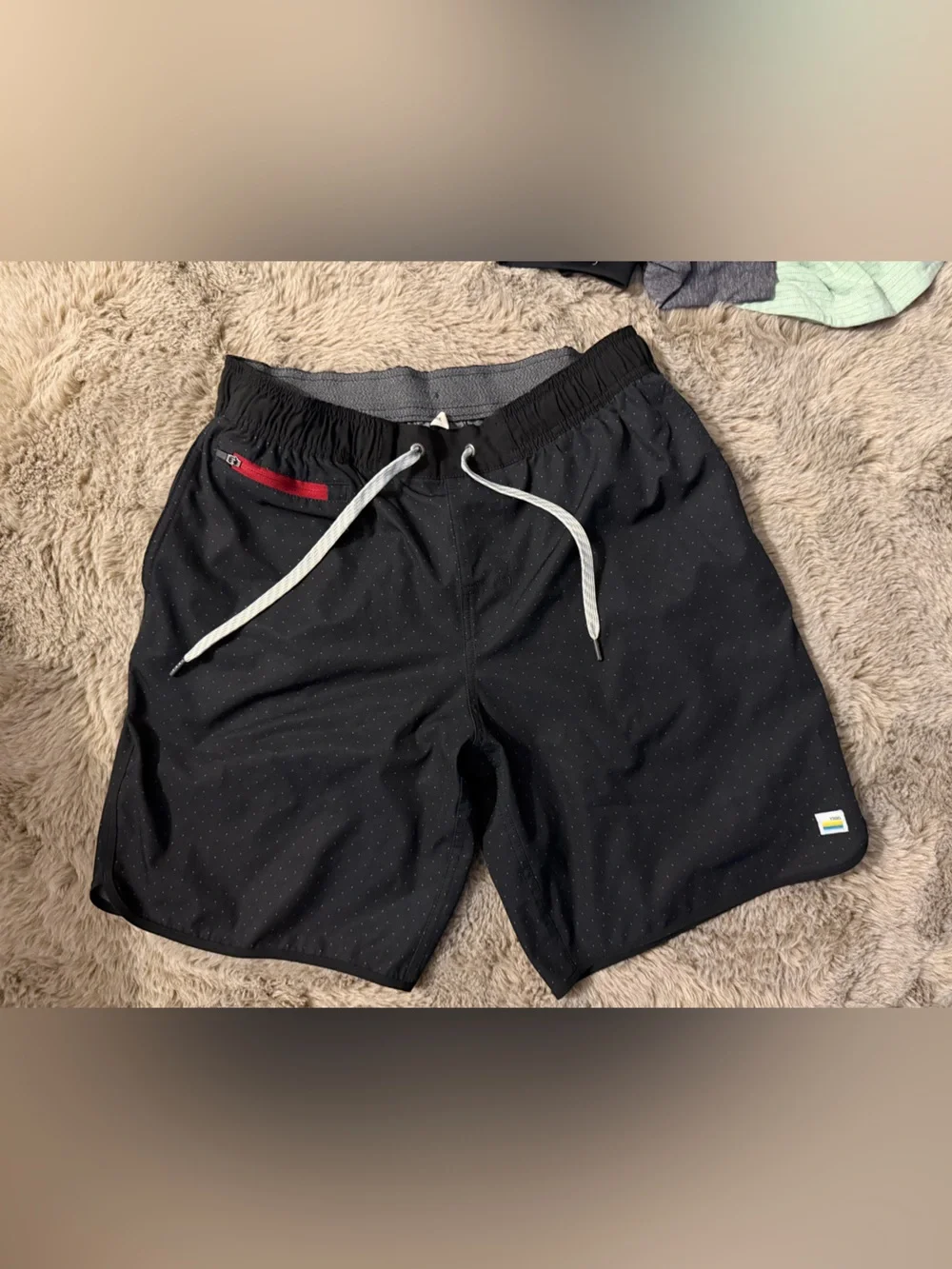 Vuori Black Athletic Shorts with Red Accent